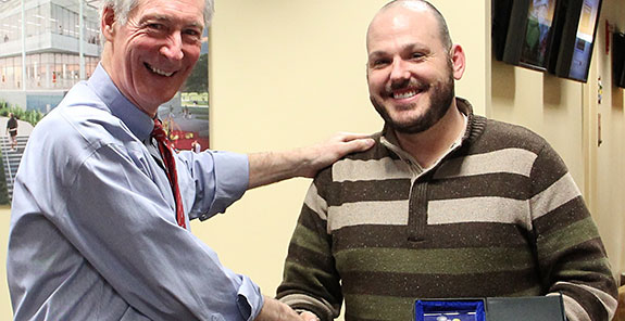 Dr. Michael Rogers receives IFNH Director’s Award for Scientific Excellence. Dr. Michael Rogers receives IFNH Director’s Award for Scientific Excellence